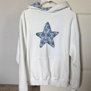 Cotton On White Hoodie with Blue Star 
only worn once !!